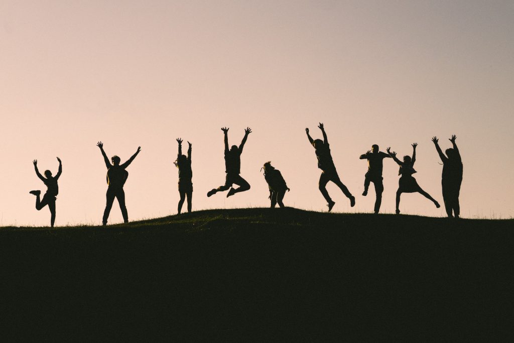 decorative image: people cheering