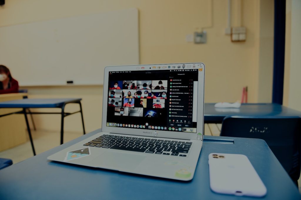 zoom screen on computer sitting in classroom